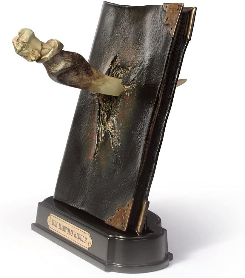 Diario di Tom Riddle col canino di basilisco